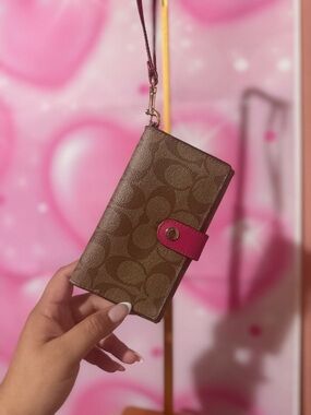 Coach Brown Signature Canvas Wristlet with Pink Snap Tab